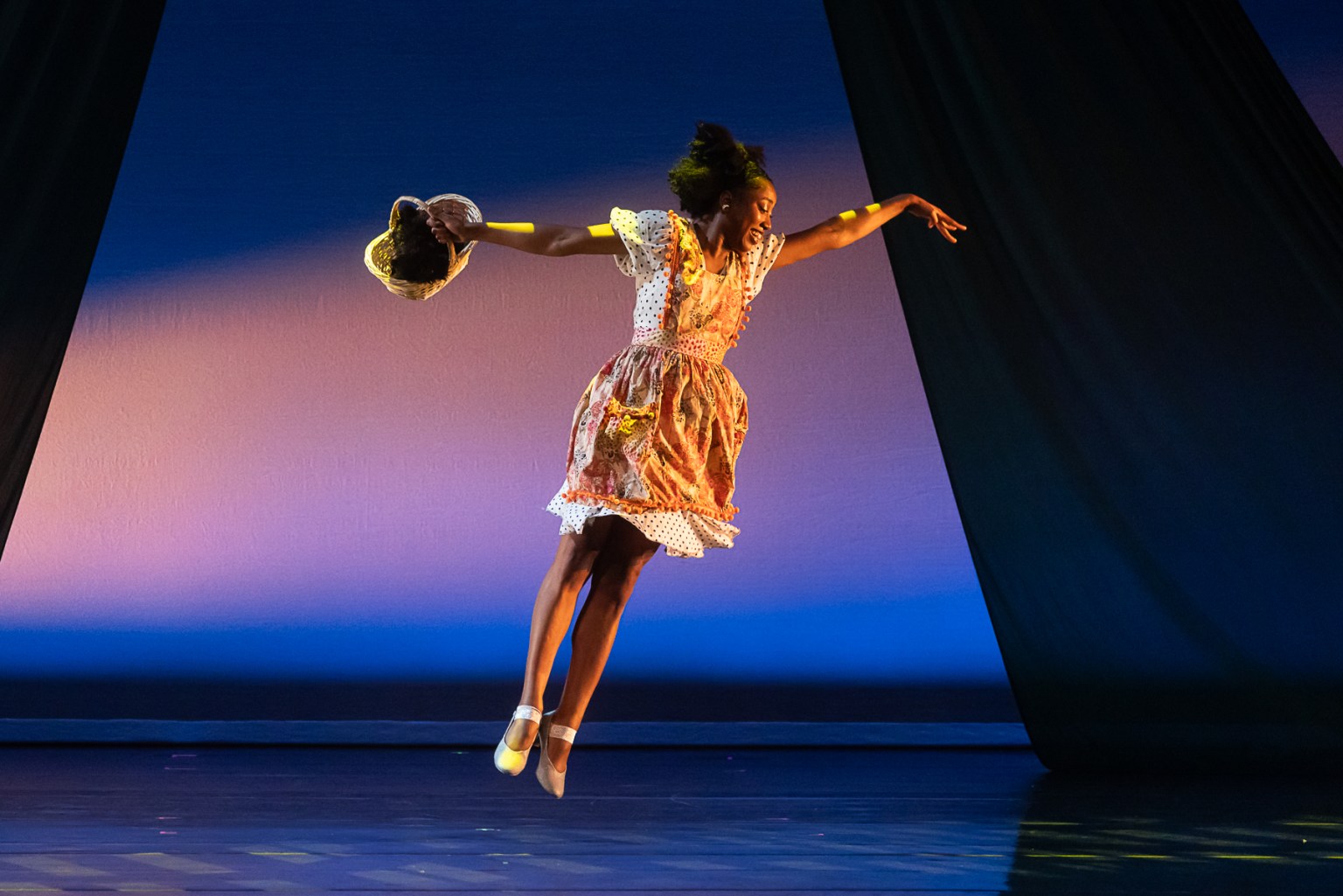 An Open Dance Project dancer leaping in The Wonderful Wizard of Oz